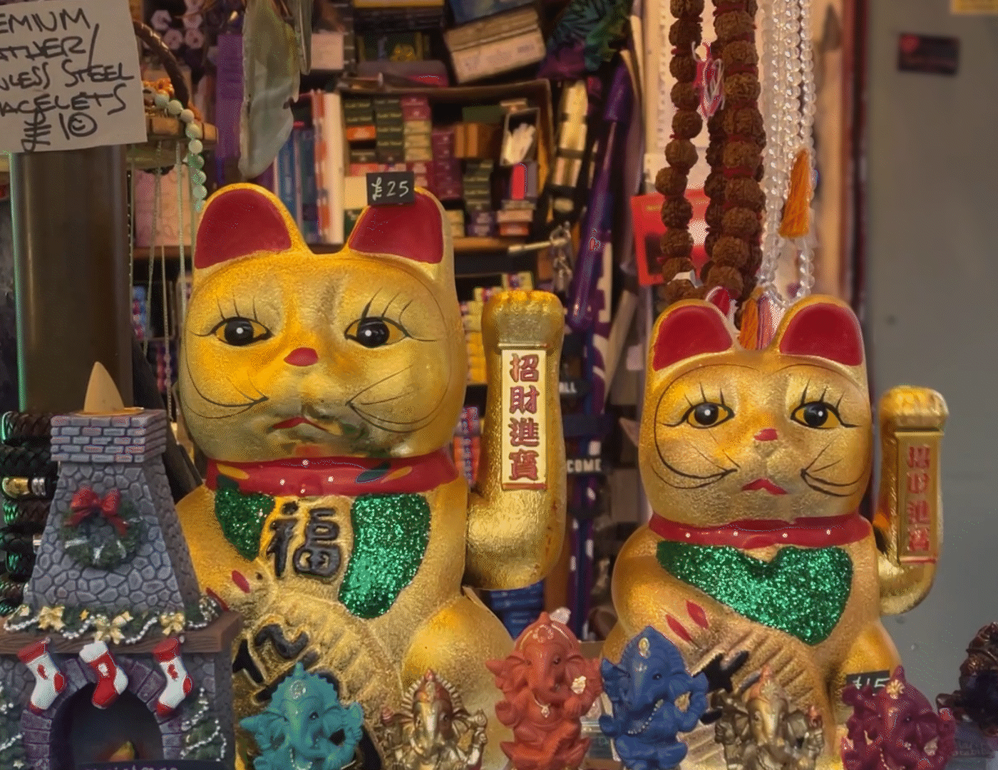 A looped gif of ornimental cats feeling zen